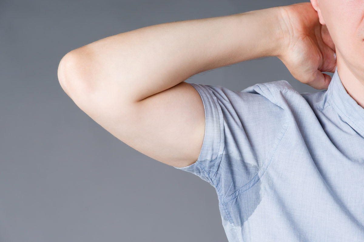 bigstock-Man-With-Sweaty-Armpits-Studi-256477024-1200x800.jpg