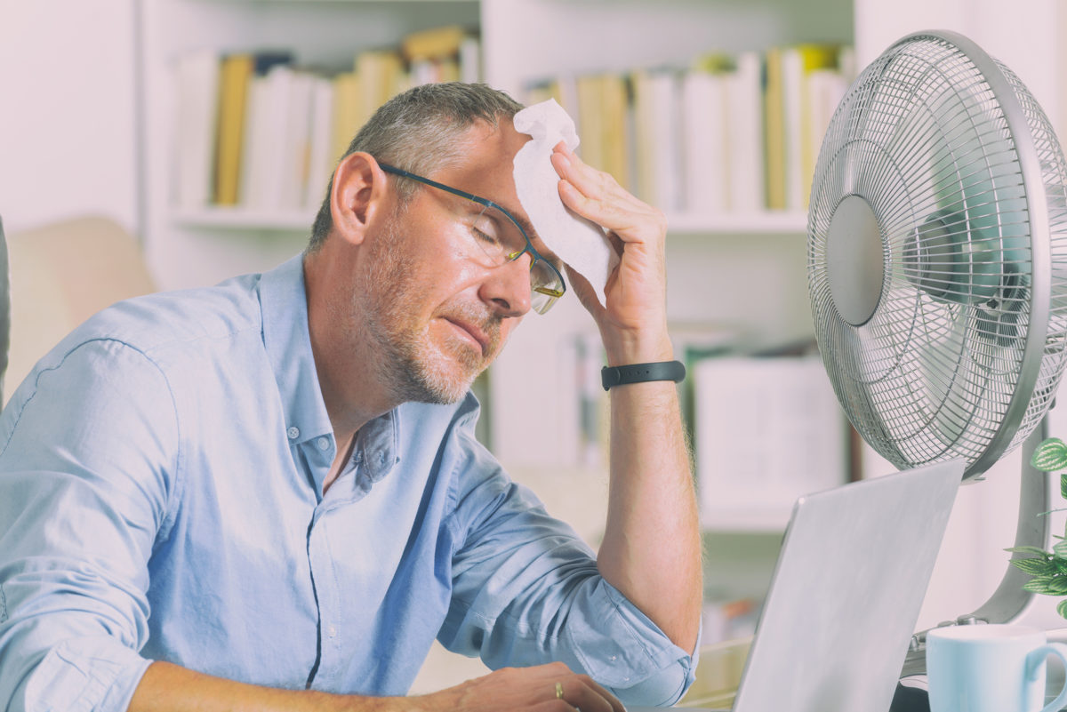 bigstock-Man-suffers-from-heat-while-wo-258274495-1200x801.jpg